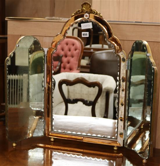 A triple folding mirror H.70cm